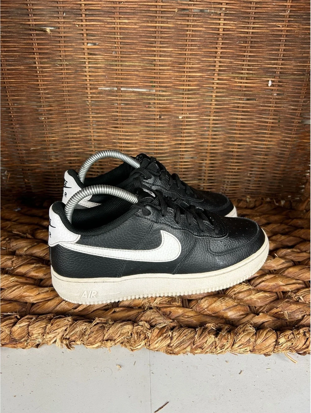Nike Air Force 1 black and white low sneakers